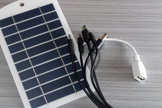 Solar cell or panel for charging any device. Concept of saving and the environment.
