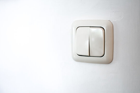 Light switch turning on electrical power in home