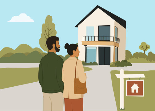 Man and woman look at a new house with a real estate sign outdoors