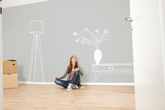Woman thinking about new living room