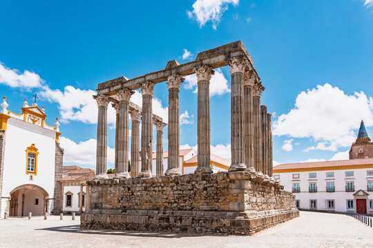 Historic Roman Temple of Evora decorates a town square in Portugal