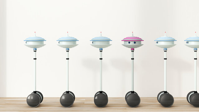 Row of little robots following each other