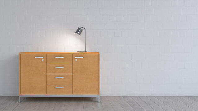 Burning lamp on sideboard