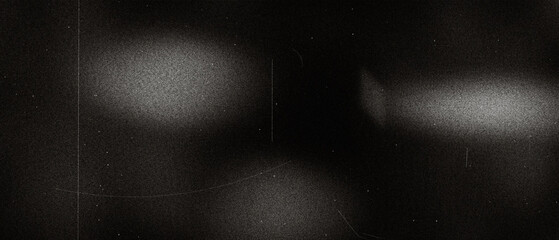 Obraz premium Vintage film texture background with black grainy surface with subtle light leaks