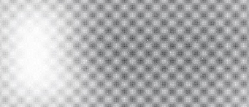 A monochromatic halftone dot pattern texture with a soft light gradient with grey