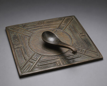 Ancient Chinese south pointing spoon compass on bronze plate