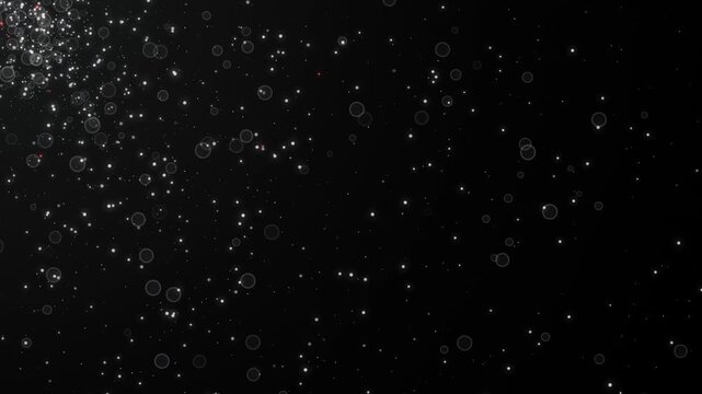 Abstract dark background with floating silver dust particles and bokeh on the left. This seamless cinematic motion graphic loop is perfect for elegant magical video designs.
