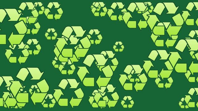 Seamless loop. Animated green recycling symbols march across dark screen in horizontal format. Playful eco-friendly motion graphic promotes sustainability and environmental awareness.