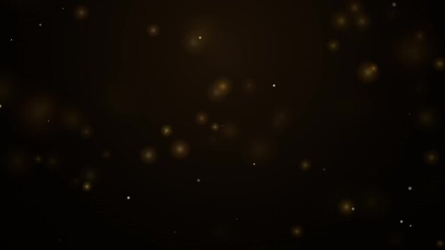 Golden floating dust particles on black background motion video