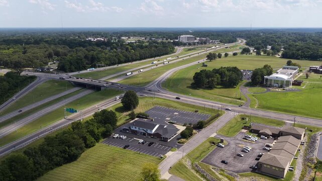 Aerial of highway interchange and commercial development in Paducah Kentucky showing multiple overpasses and large parking lots