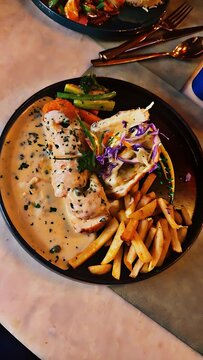 Gourmet Grilled Chicken Breast with Creamy Sauce, Golden French