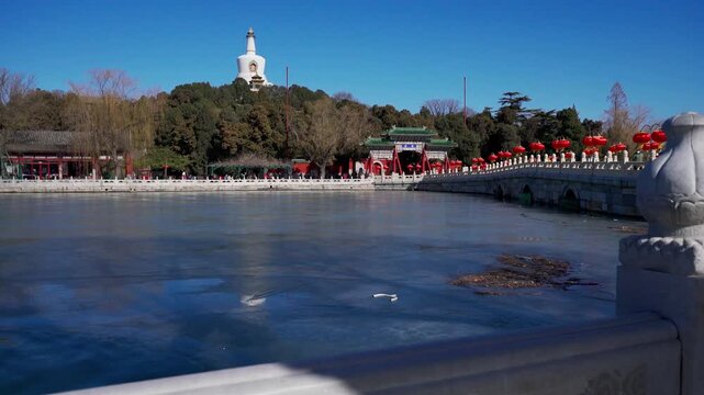 White Pagoda on Frozen Beihai Lake in Beihai Park, Beijing, China