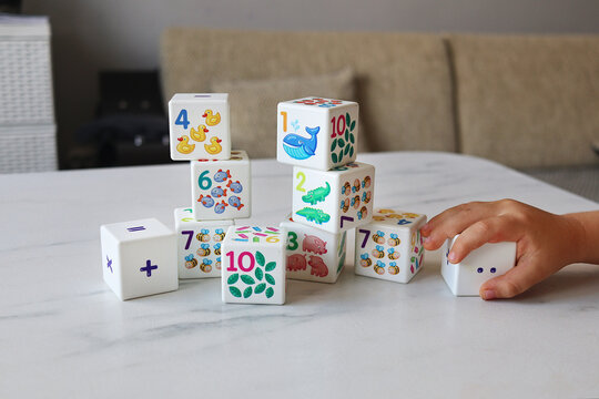 Colorful Educational Counting Blocks for Children on Table at Home