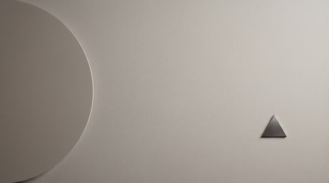 Minimalist interior wall design with a large circular cutout and small metallic triangle element