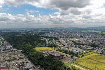 Obraz premium Aerial drone photo of baseball stadium and urban district in Kimitsu, Chiba, Japan
