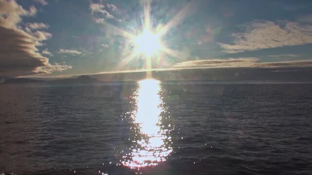 Cold Arctic water carries floating ice across the remote polar seascape, showing the frozen surface, open ocean, and wide northern environment. The source identifies the location near Norway.