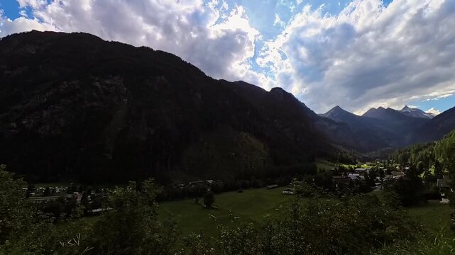 4K Timelapse alpine summer video with moving clouds at Heiligenblut am Grossglockner, Spittal an der Drau, Moelltal valley, Nationalpark Hohe Tauern, Kaernten, Austria