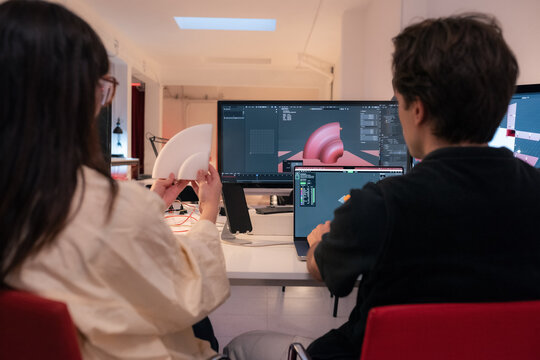 Designers working on 3d modelling project
