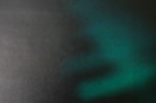 Teal Textile Background with Soft Blur and Dark Atmospheric Tones