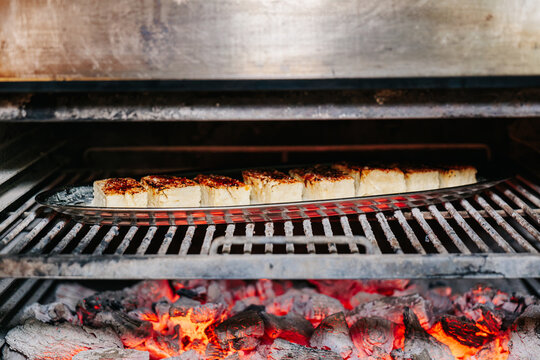 Platter of dessert over hot coals