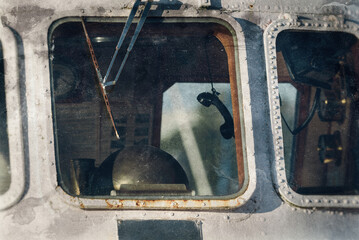 VERY OLD SHIP - Classic wheelhouse interior seen through the window (photo in the style of analog photography) © Wojciech Wrzesień