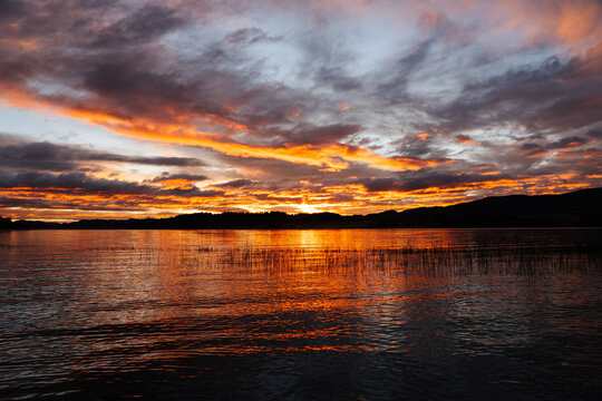 Golden Sunset Over Calm Lake