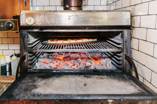 Baking dessert in charcoal oven