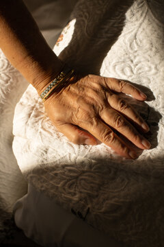 Close-up of an elderly woman's hand
