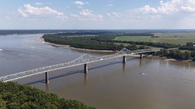 Aerial of truss bridge crossing the Mississippi River in rural Cairo Illinois at confluence with Ohio River