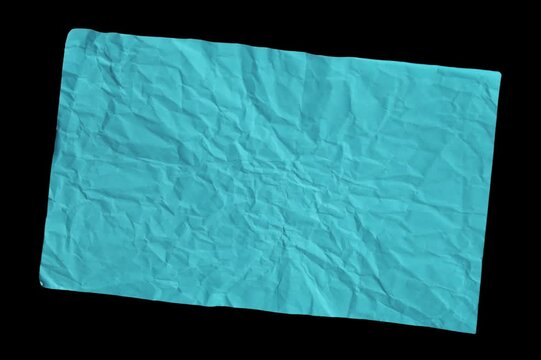 Bright cyan crumpled paper sheet texture for creative craft projects isolated