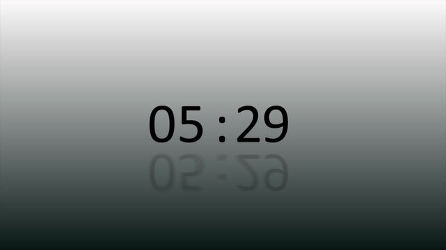 Digital clock display showing nine twenty one on a grey gradient background a modern digital time display