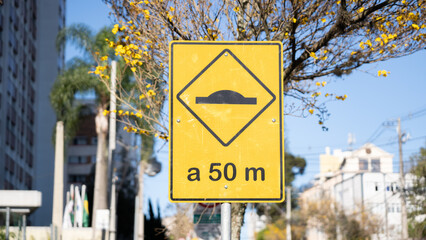 Speed bump warning sign 50 meters ahead in Brazil © Endrio