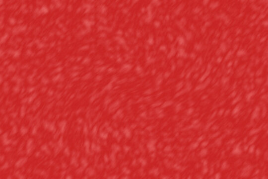 Vibrant red textured surface featuring soft blurred abstract patterns for creative graphic design