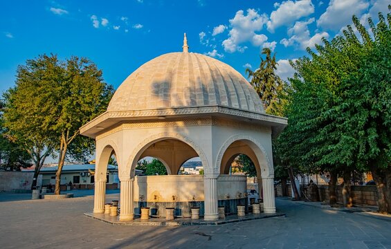Traditional dome shaped stone ablution fountain shadirvan in the courtyard of Hz. Veysel Karani Mosque in Siirt, Turkey.