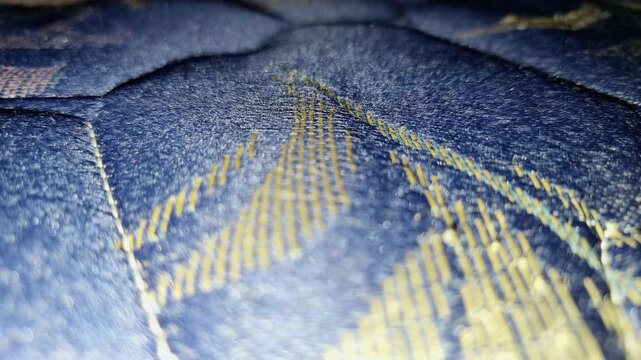 Blue Quilted Mattress Fabric Moving Slowly For Comfort And Bedding Concept Extreme Macro 4K