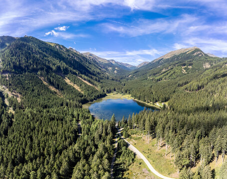 
aerial view of lake Ingeringsee in the Seckau Tauern ( Seckau Alps ) in Styria, Austria