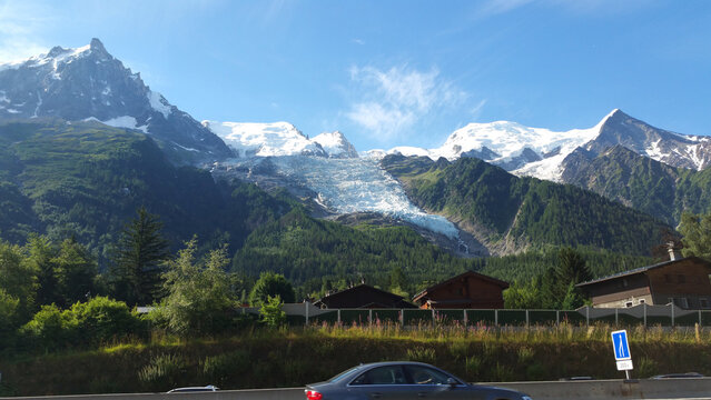 The Mont Blanc massif, straddling the France&ndash;Italy border, seen from a road trip along the valley (likely the route through the Mont Blanc Tunnel corridor, Courmayeur on the Italian side and Chamonix,