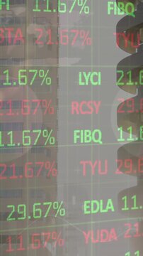 Animation of multicolored trading board over multiple graphs against modern buildings