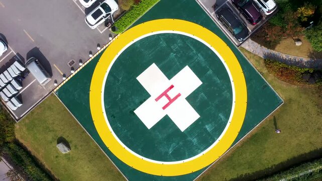 Aerial View of Hospital Helipad with Medical Cross