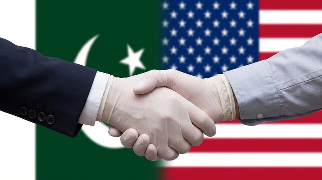 Handshake between Pakistan and USA representatives for international diplomatic cooperation.