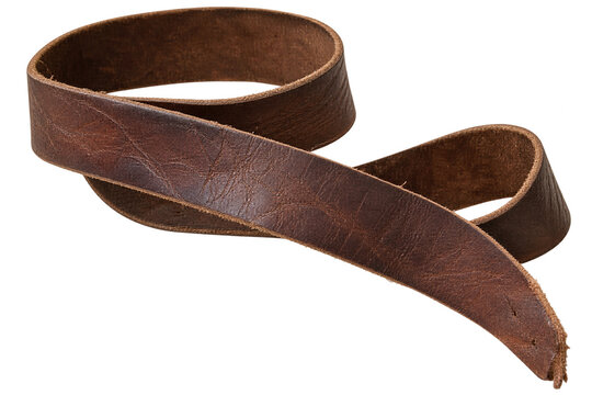 Coiled strip of distressed brown leather isolated on a transparent background