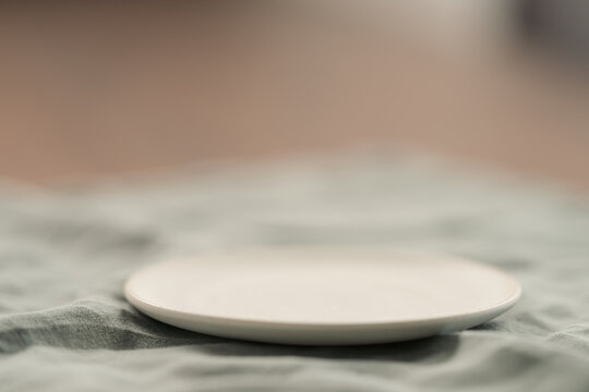 small white ceramic saucer with copy space
