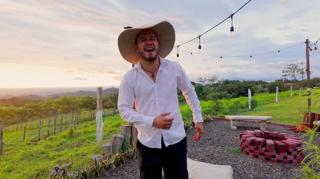Latin farmer singing passionately in a vineyard at sunset