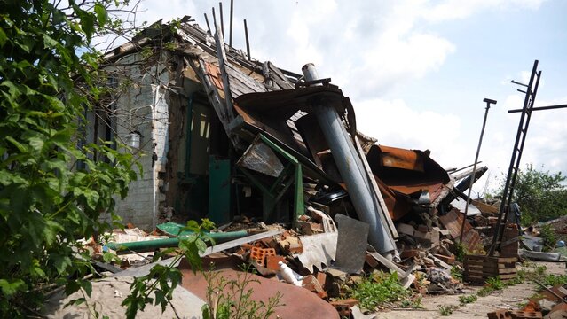 View to destroyed residential buildings at Kharkivska oblast. Ruined houses after bomb attacks on ukrainian territory from russia army. Consequences of russian invasion of Ukraine. Slow motion
