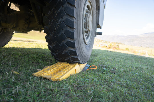 Wheel chock yellow stop is used to fix the wheel of a truck