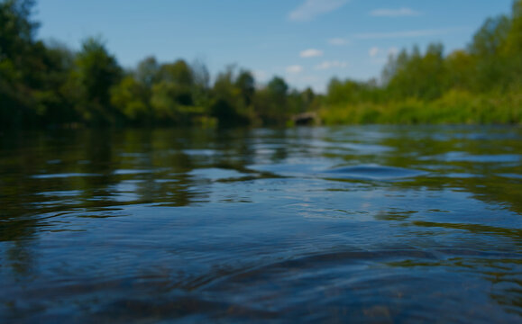 Low Angle Shot of Calm River Water Flowing, Raba river , Poland , 2026 September