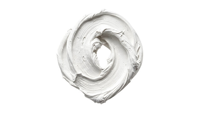 Circular swirl of thick white cosmetic cream or textured paint isolated on white background.