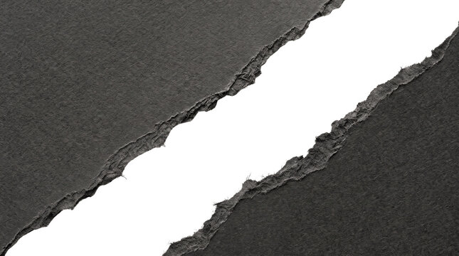 Black paper with diagonal ripped edge revealing white background.