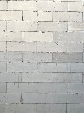 ​White light weight concrete block wall texture background for industrial and construction design concepts