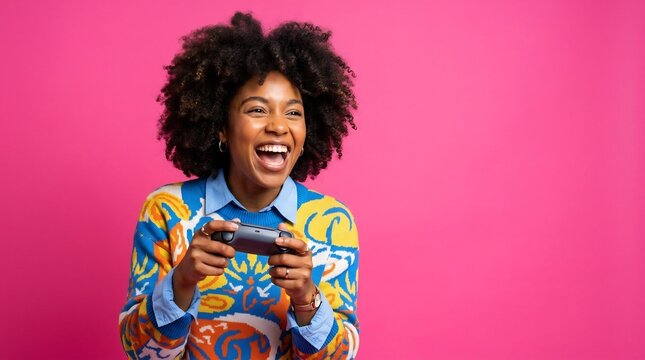 Excited young Black woman playing video games with a controller, laughing loudly on a vibrant pink background, gaming enthusiast, fun entertainment, diverse female gamer.